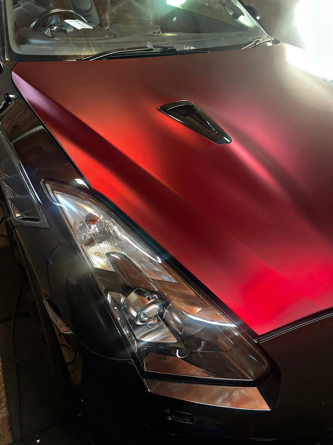 Customer photo review of Mallcas™ Chrome Romance Red Vinyl Wrap (PET Liner)