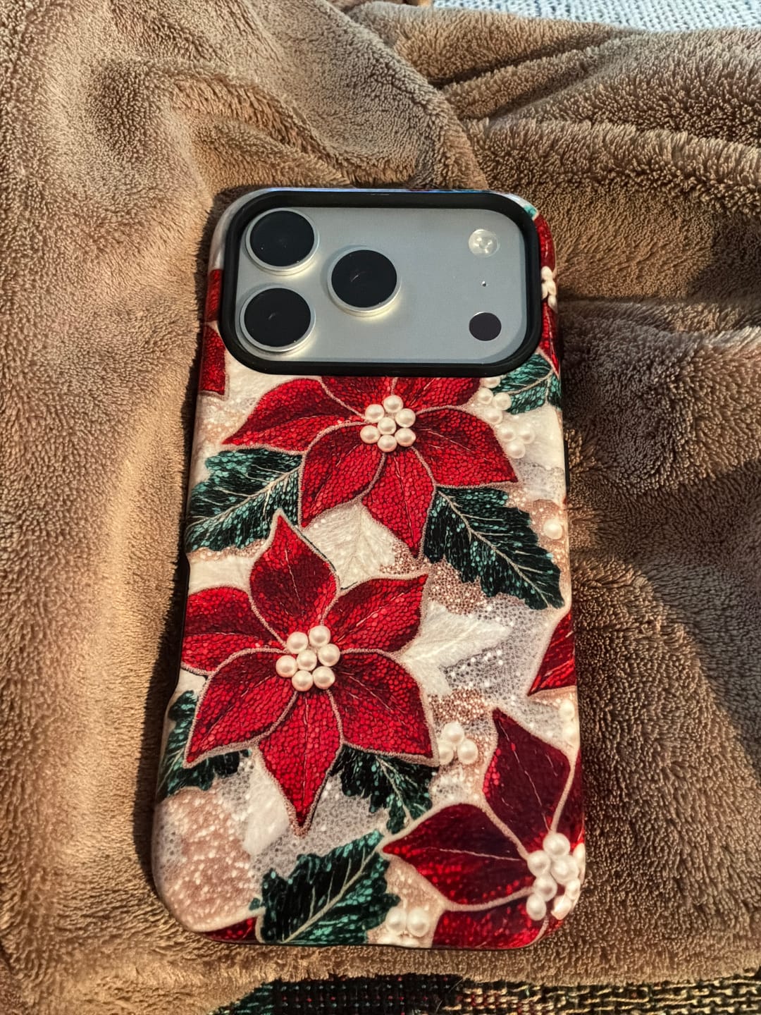 Customer photo review of Christmas Poinsettia Flower Design iPhone Case