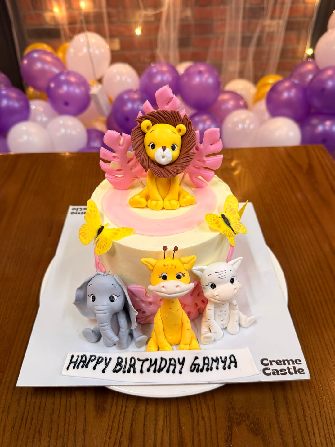 Customer photo review of Jungle theme pink Cake