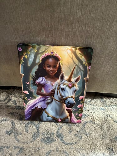 Customer's 'The Lavender Unicorn Princess' canvas print showing a young princess in a lavender dress riding a white unicorn.