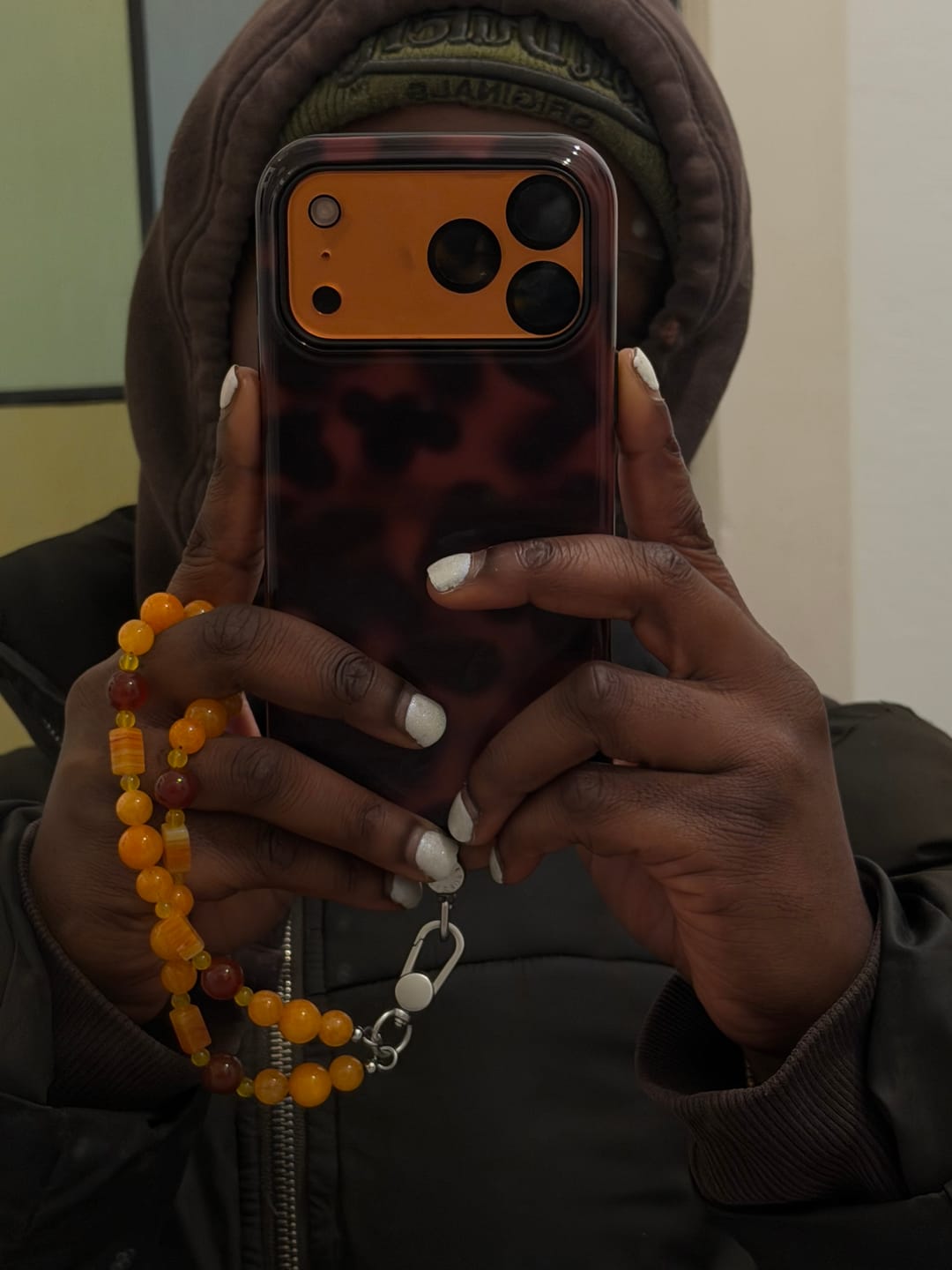 Customer photo review of Mandarin Sun - Phone Charm
