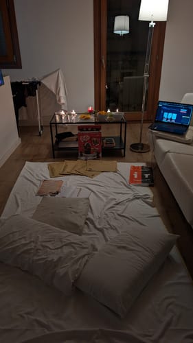 Customer's Holmes vs Ripper game set up for a date night in a cozy, dimly-lit living room.