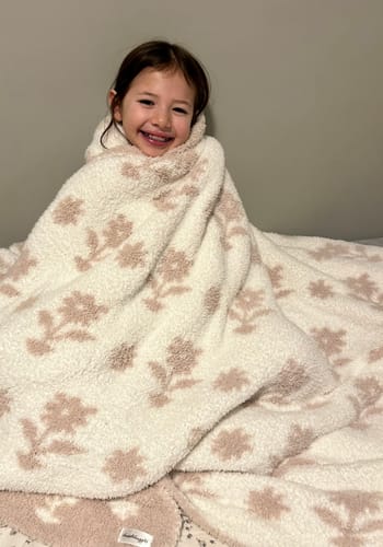 Customer photo review of Flower Print Blushing Beige and White Extended Throw