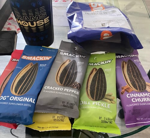 Reviewer's colorful bags from the VARIETY PACK, including Original and Dill Pickle, fanned out on a table.