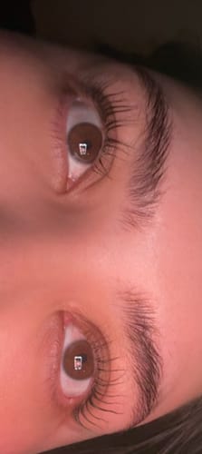 Customer's close-up of beautifully lifted lashes after receiving the Korean Lash Lift.