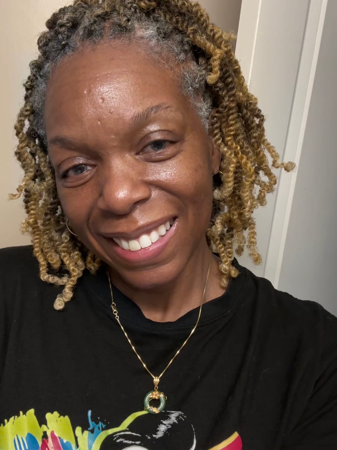 Customer photo review of Outre X-Pression Twisted Up Crochet Braid - 3X SPRINGY AFRO TWIST 16"