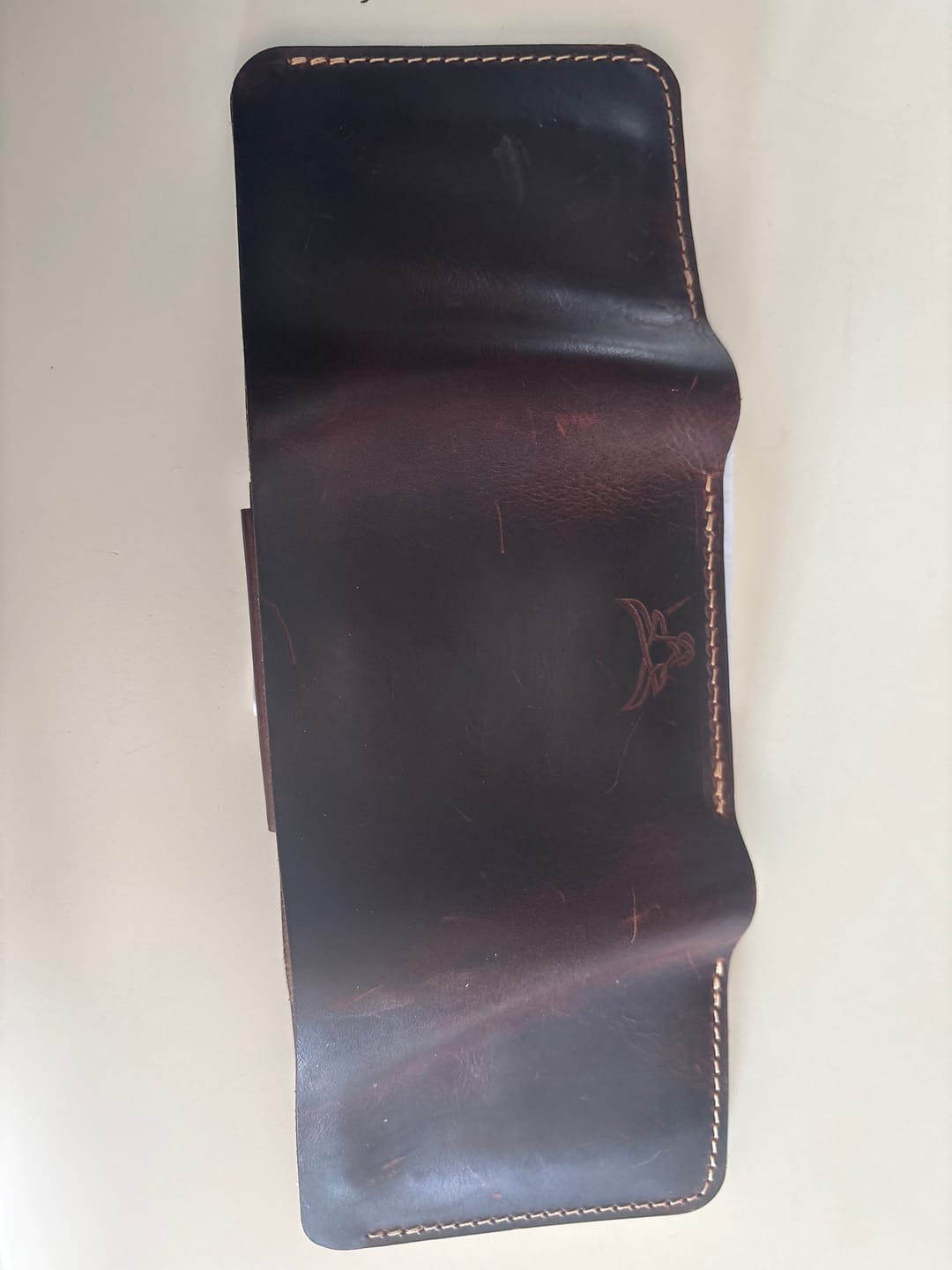 Customer photo review of Badge Trifold Wallet
