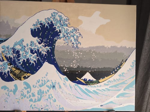 Customer's completed painting from The Great Wave off Kanagawa paint by numbers kit, shown on a canvas.