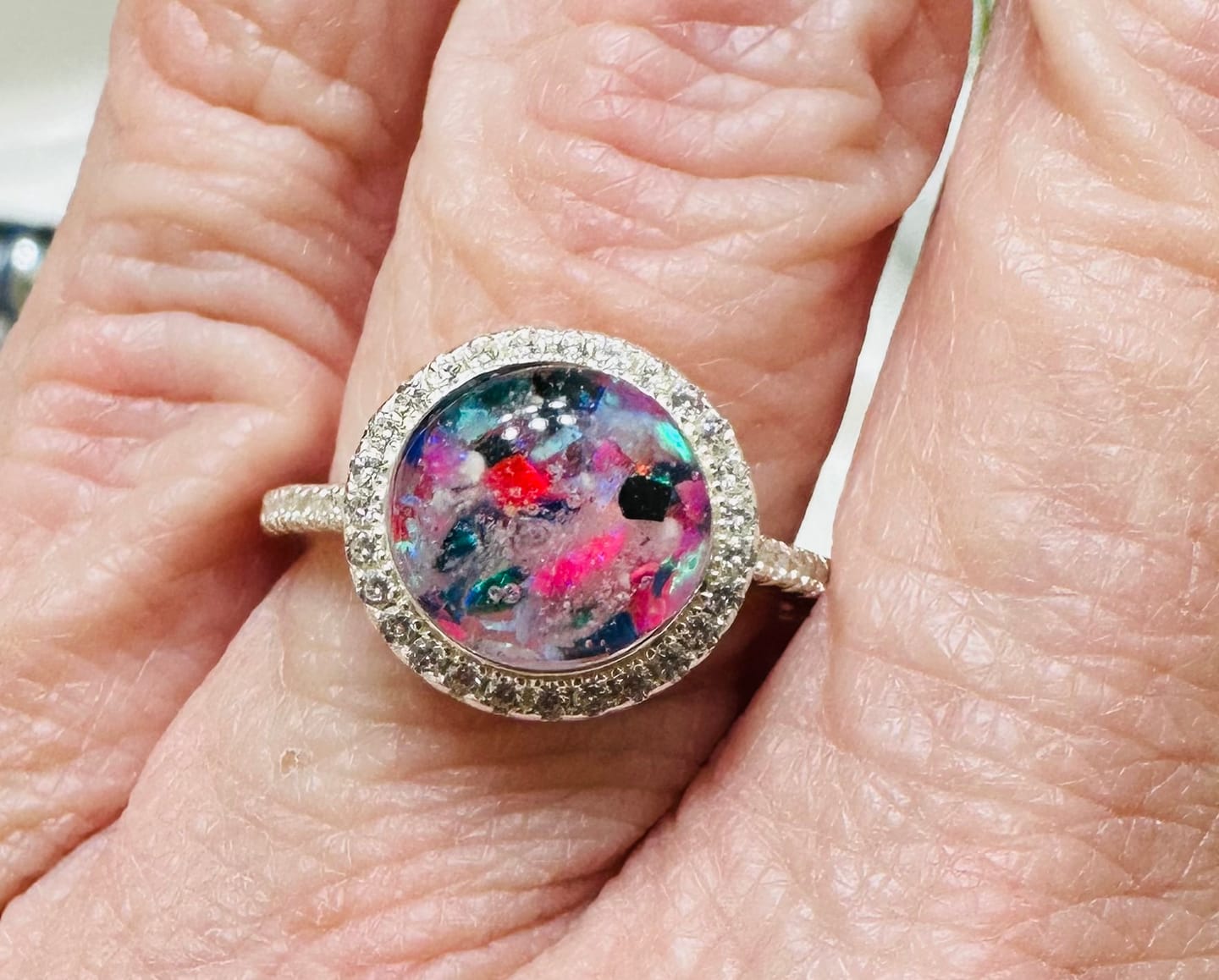 Customer photo review of Bedazzled Circle Opal Cremation Ring