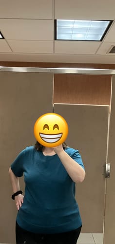 Reviewer showing the fit of the Anna Crew Sweater in vibrant Harbor Teal.