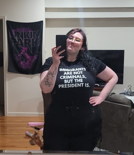 Customer photo review of Immigrants Front English and Back Spanish Unisex T-Shirt