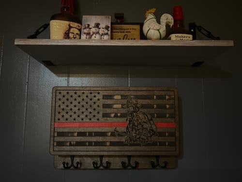 Customer photo review of PERSONALIZABLE FLAG WITH FIREFIGHTER MINI MODEL