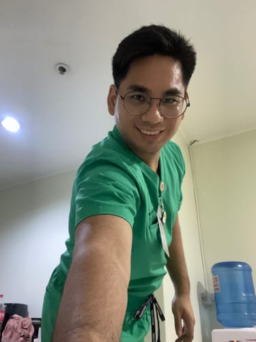 Customer photo review of 4-Pocket MoveTech® Scrub Top - Men / Cactus