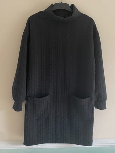 Customer's completed black dress made from the Cable Knit Jersey Fabric, shown from the front.