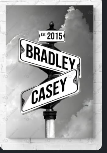 Reviewer's personalized canvas showing black and white street signs with the names 'Bradley' and 'Casey' and the date 'EST. 2015'.