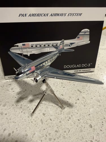 Customer's silver GEMINI200 PAN AMERICAN DC-3 die-cast model on its stand, with the product box shown in the background.