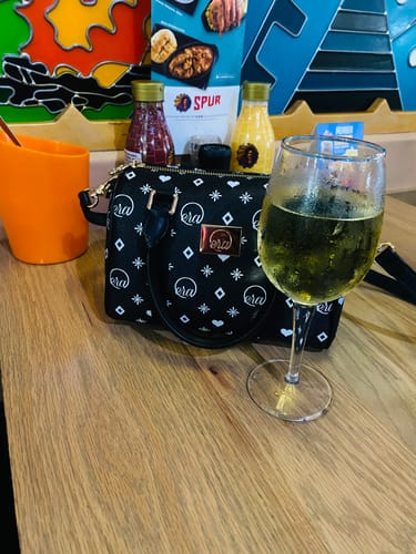 Customer photo review of The Mini Go Getter Bag