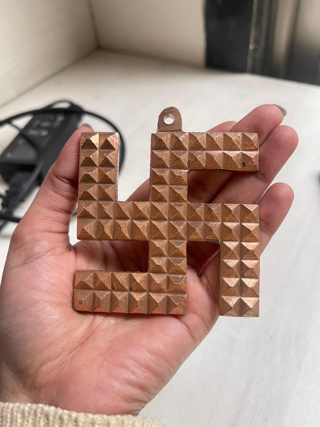 Customer photo review of Authentic Copper Swastik Pyramid Vastu Remedy for Positive Energy, Dosh Nivaran & Main Door Entrance – Multi-Size Home & Office Use | Vastu Mandir