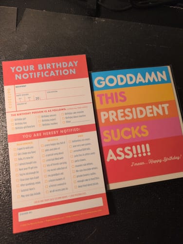 Customer's 'Your Birthday Notification Notepad' shown next to a funny, political birthday card mentioned in their review.