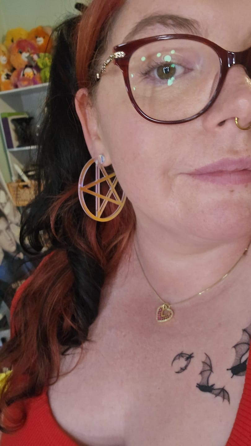Customer photo review of Iridescent Pentacle Earrings