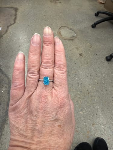 Customer photo review of Louily Exclusive Radiant Cut Light Aquamarine Blue Engagement Ring In Sterling Silver