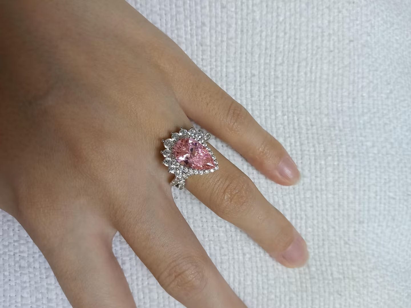 Customer photo review of Vintage 4.0Ct Pink Stone Halo Pear Cut Twist Engagement Ring In Sterling Silver