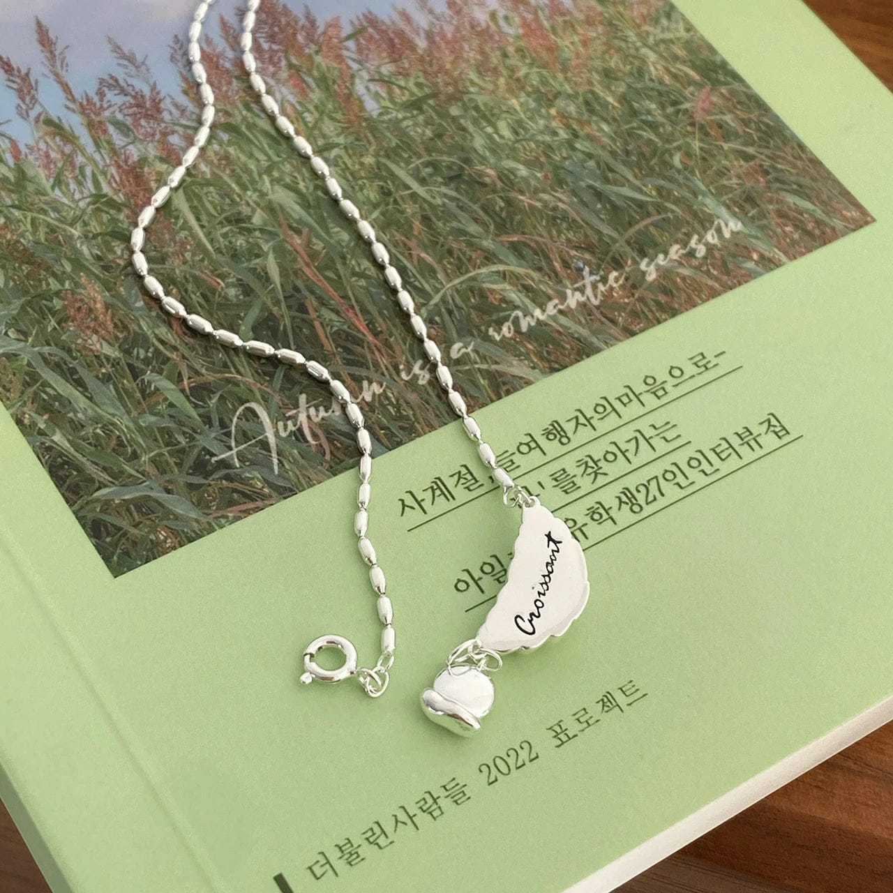 Customer photo review of Croissant Pendant Necklace