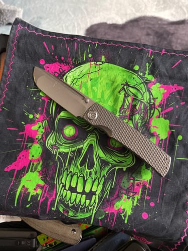 Customer photo review of Kubey Mosquito Titanium Frame Lock Knife M390 3.46"