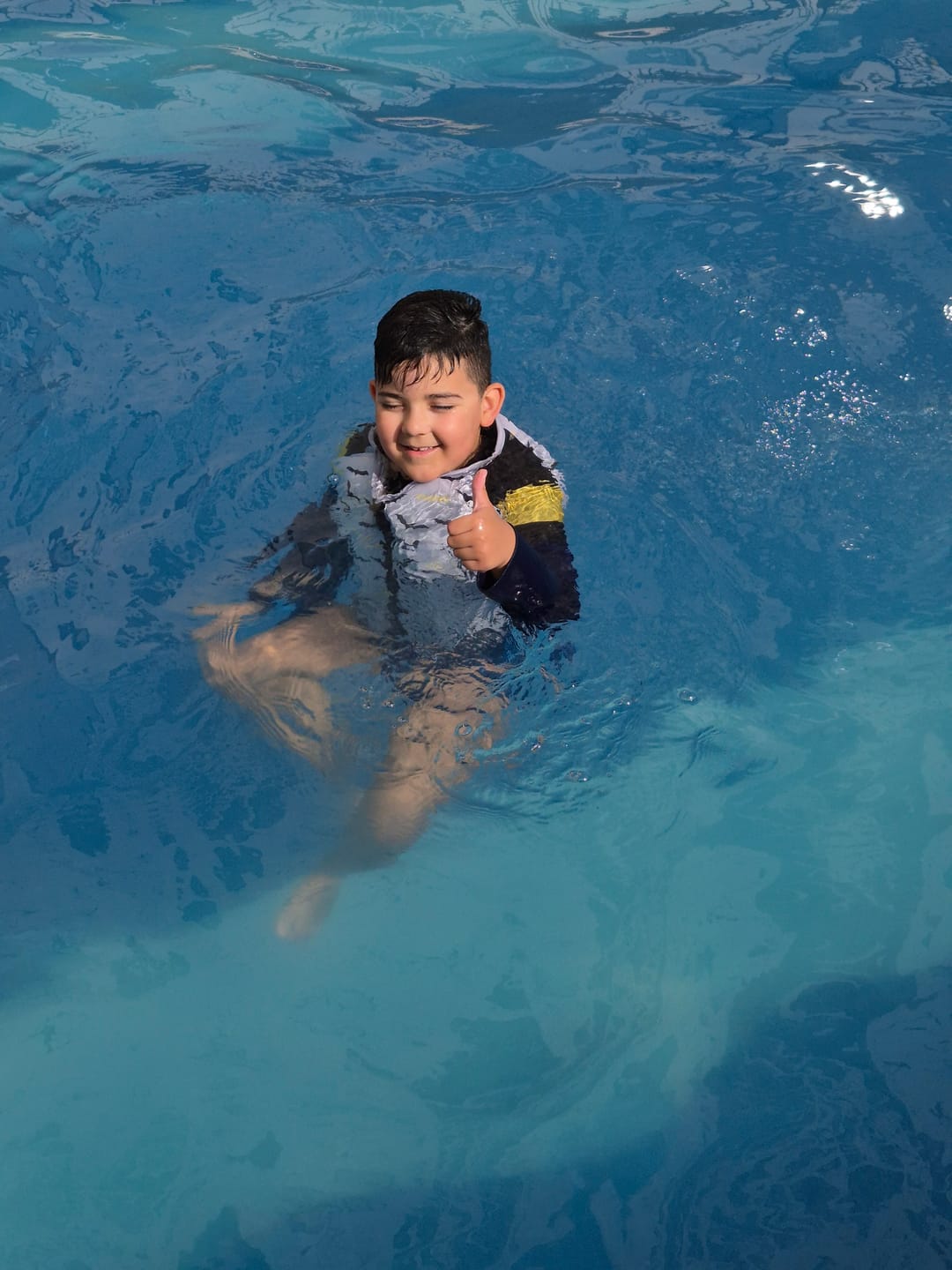 Customer photo review of Camisa Flutuadora Infantil Floater