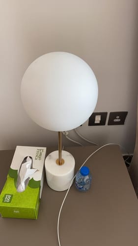 Customer's Led E27 Vintage Bulb shown illuminating a modern, white spherical table lamp.