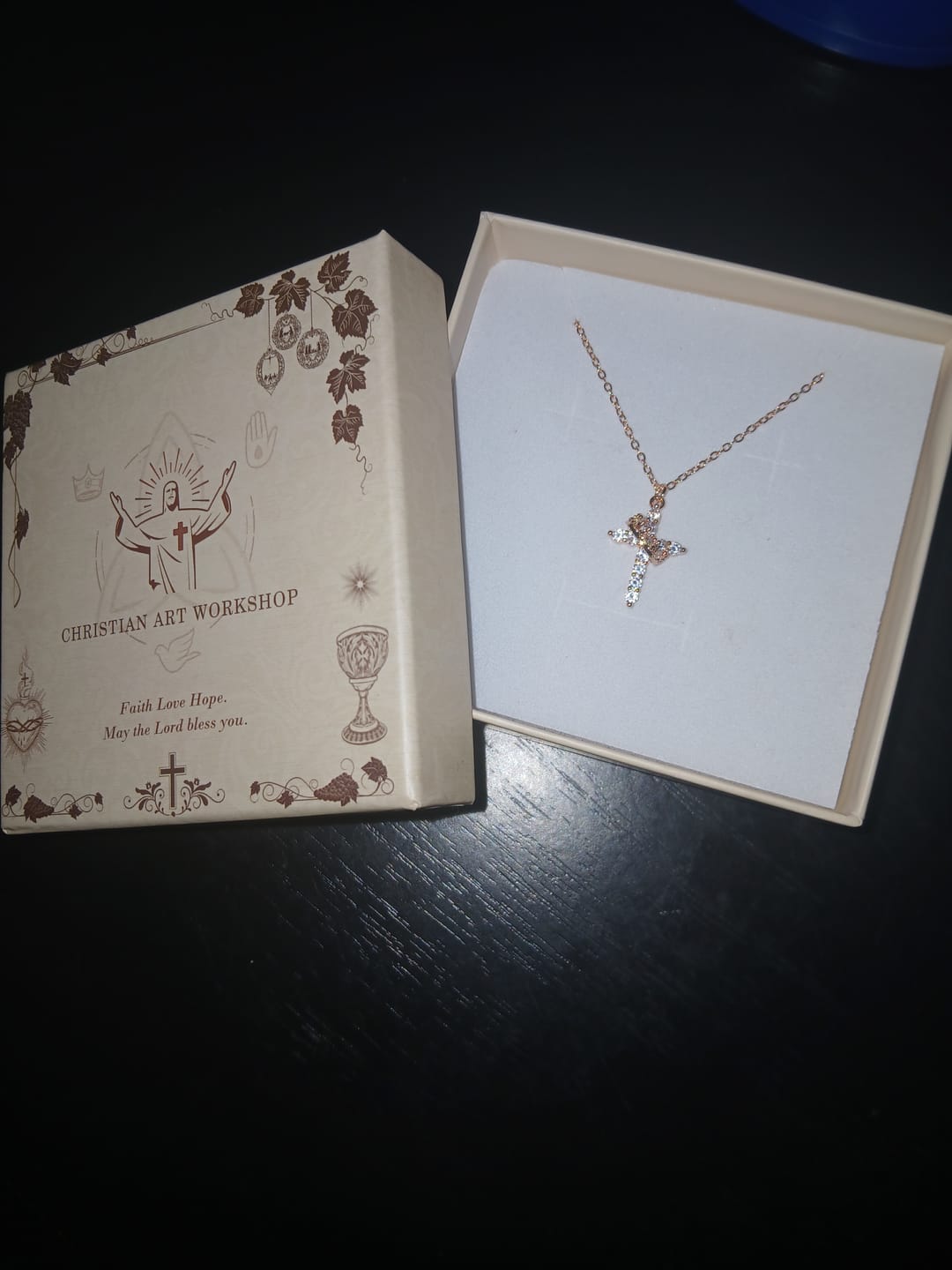 Customer photo review of FREE Today: Modern Crowned in Faith Cross Necklace, Earrings
