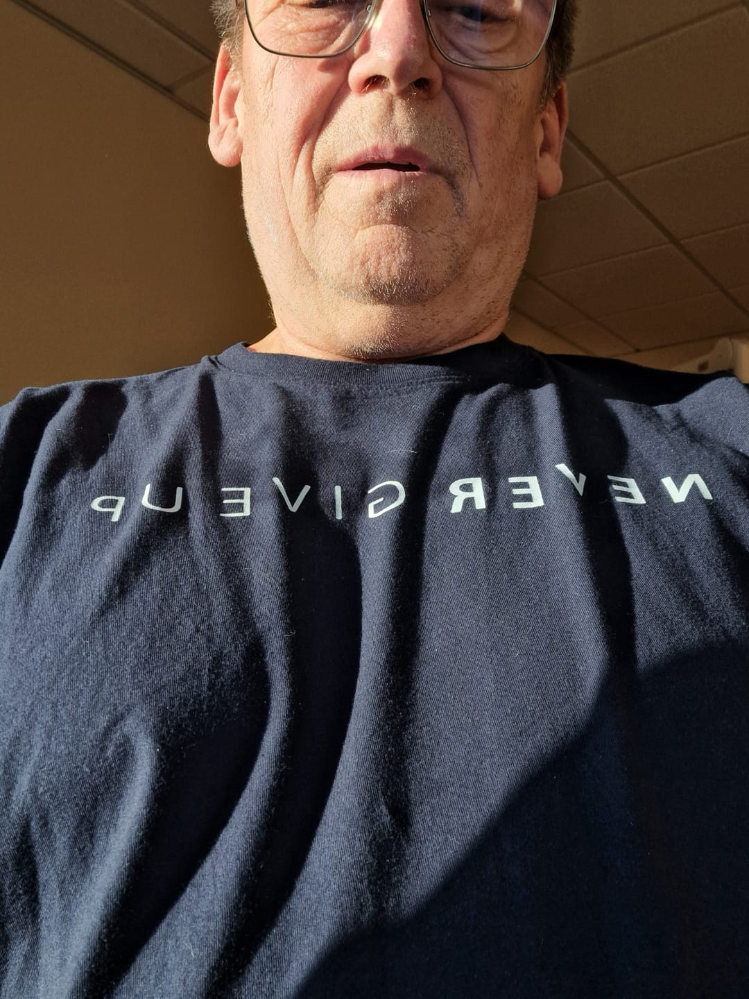 Customer photo review of Never Give Up T-shirt
