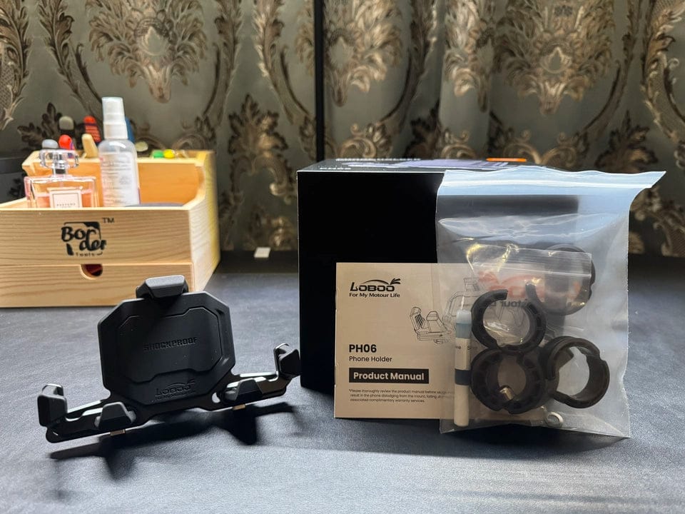 Customer photo review of LOBOO PH06 Anti-Vibration Phone Mount - Magnetic Damping + 15W Wireless Charging - Aluminum Motorcycle Holder (Fits 4.7"-7.2" Phones)
