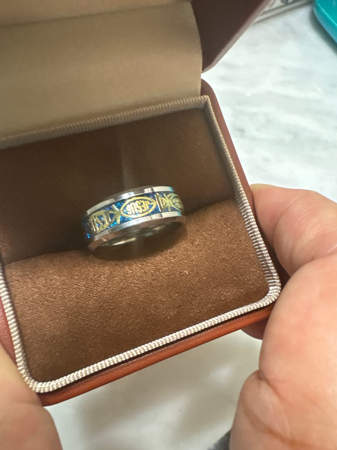 Customer photo review of Christianartworkshop Rustic Stainless Steel Ring: "Jesus" in Fish