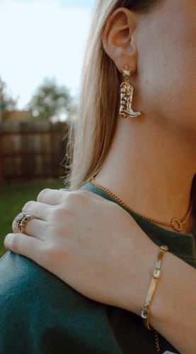 Customer photo review of Star-Studded Cowboy Boot Earrings