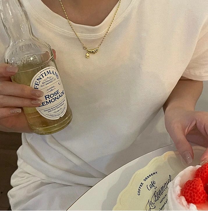 Customer photo review of Croissant Pendant Necklace