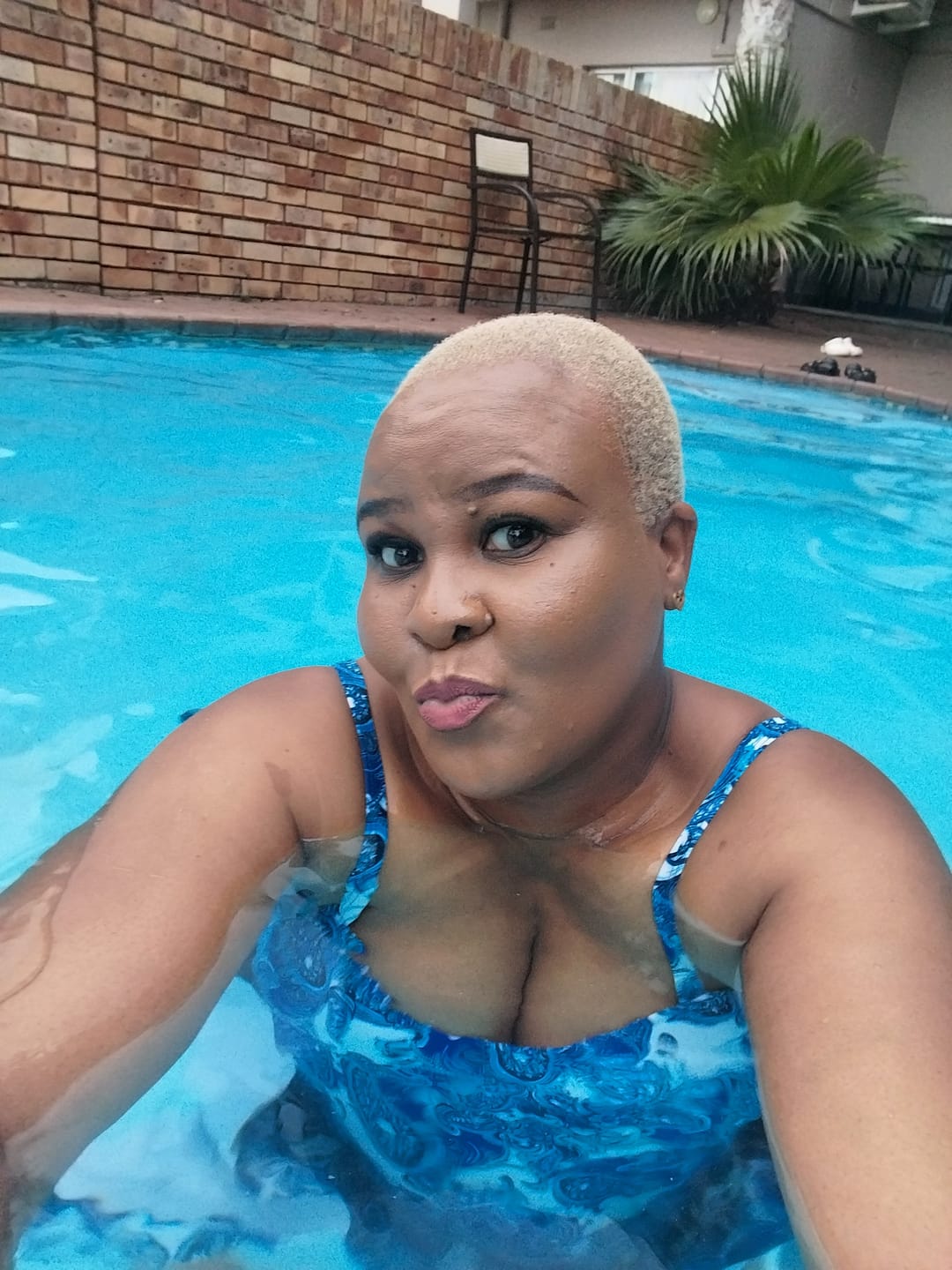 Customer photo review of Gold Thando Studs