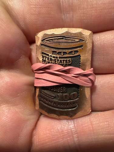 Customer photo review of The Hundred Roll - Copper Golf Ball Marker