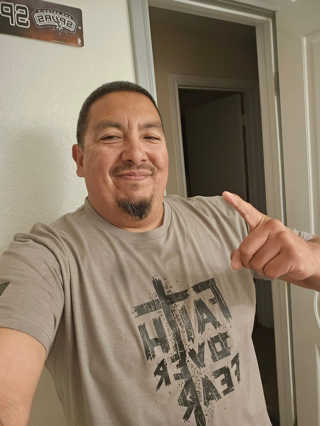 Customer photo review of Faith Over Fear Tee