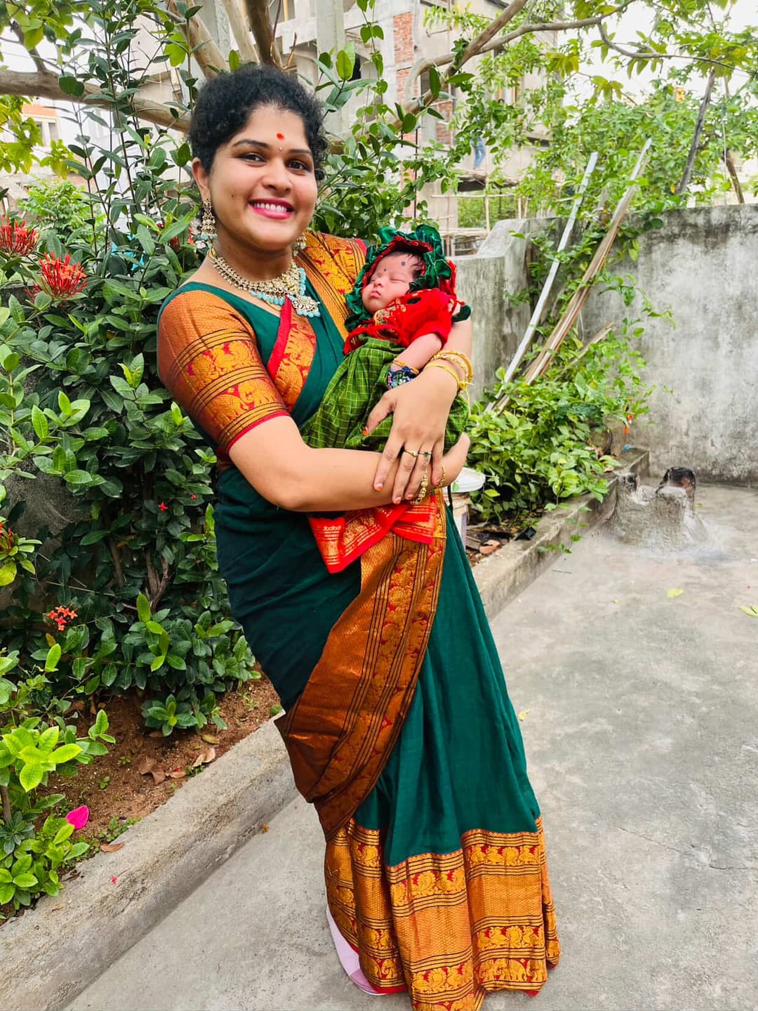Customer photo review of Traditional green and red checked langa jacket ethnic wear for baby girl