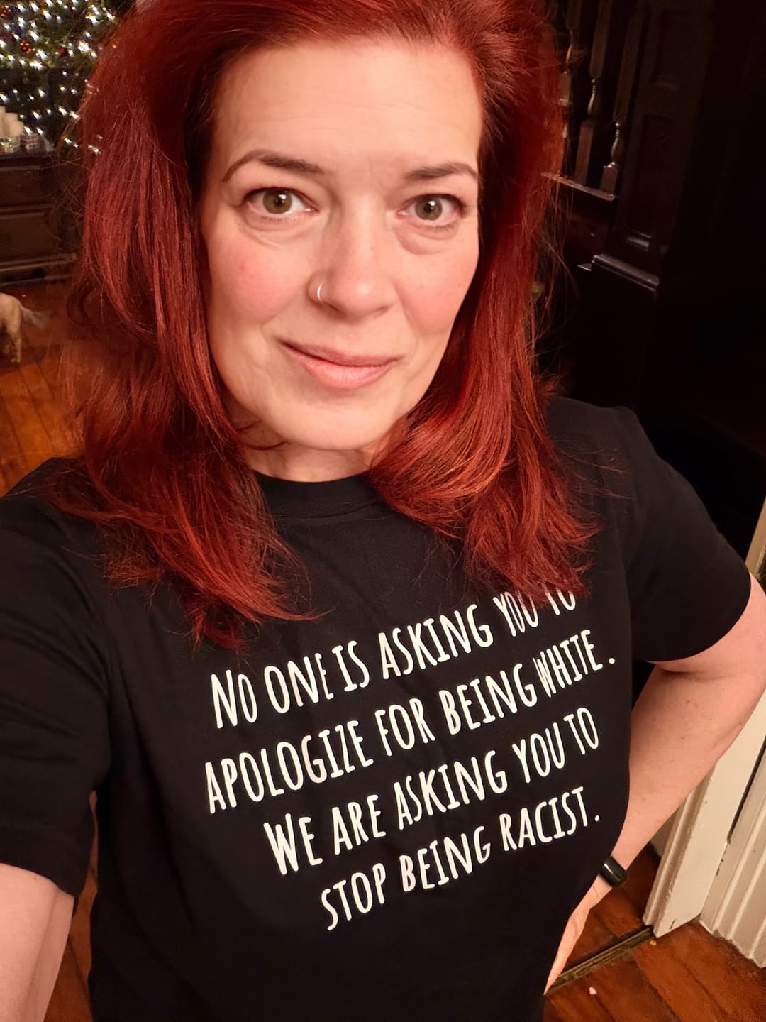 Customer photo review of No one is asking you to apologize for being white. We are asking you to stop being racist Unisex Tee