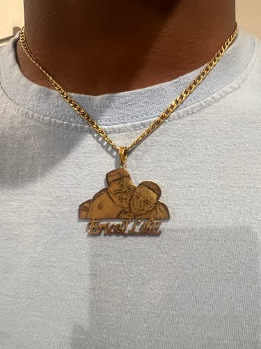 Reviewer wearing the gold-colored Custom Photo Engraved Pendant Necklace, showing the custom shape and detailed engraving.