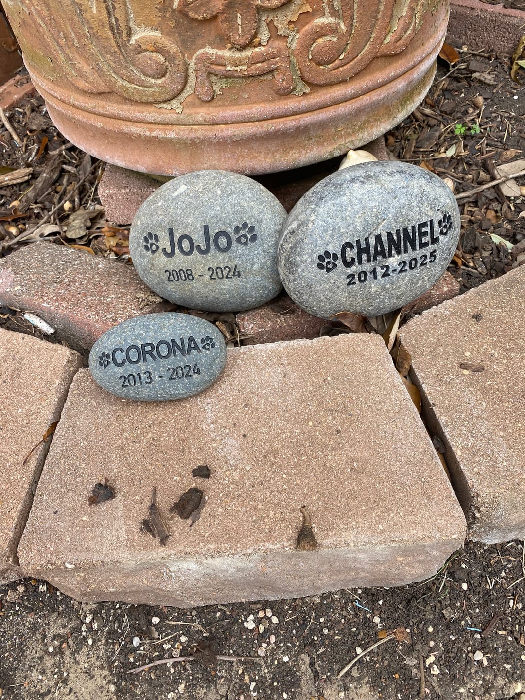 Customer photo review of Pet Grave Marker   Custom Engraved Pet Memorial Stone Paw Prints