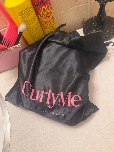 Customer photo review of CurlyMe Layered Cut Pre-Bleached Body Wave Pre-Cut HD Lace Wear Go Glueless Wigs