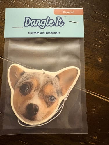 Customer's custom air freshener featuring a photo of their chihuahua, shown in its original packaging.