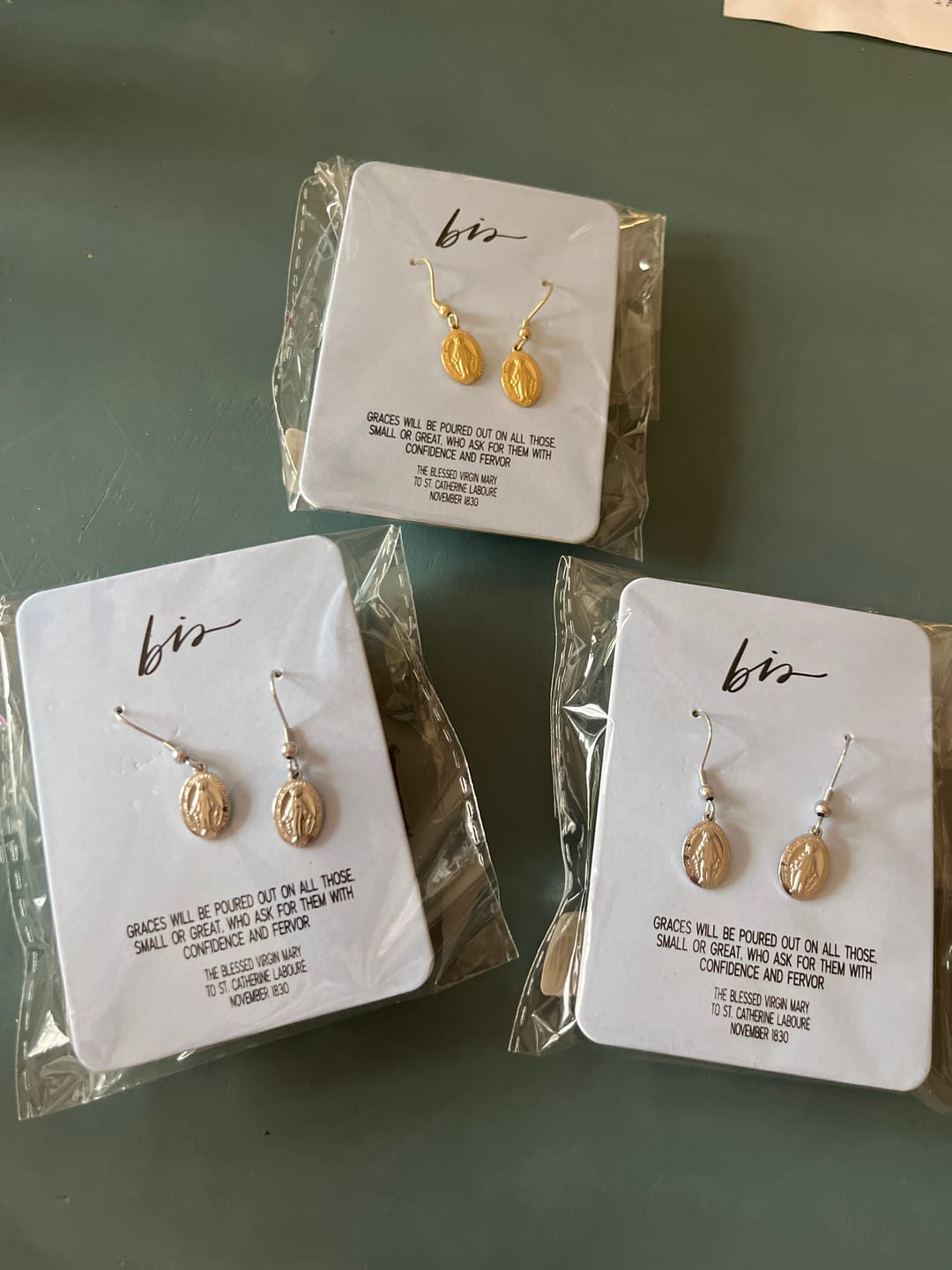 Customer photo review of Miraculous Medal Earrings // Silver