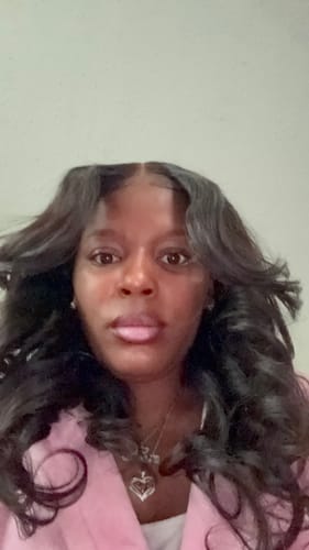 Customer photo review of CurlyMe Layered Cut Pre-Bleached Body Wave Pre-Cut HD Lace Wear Go Glueless Wigs