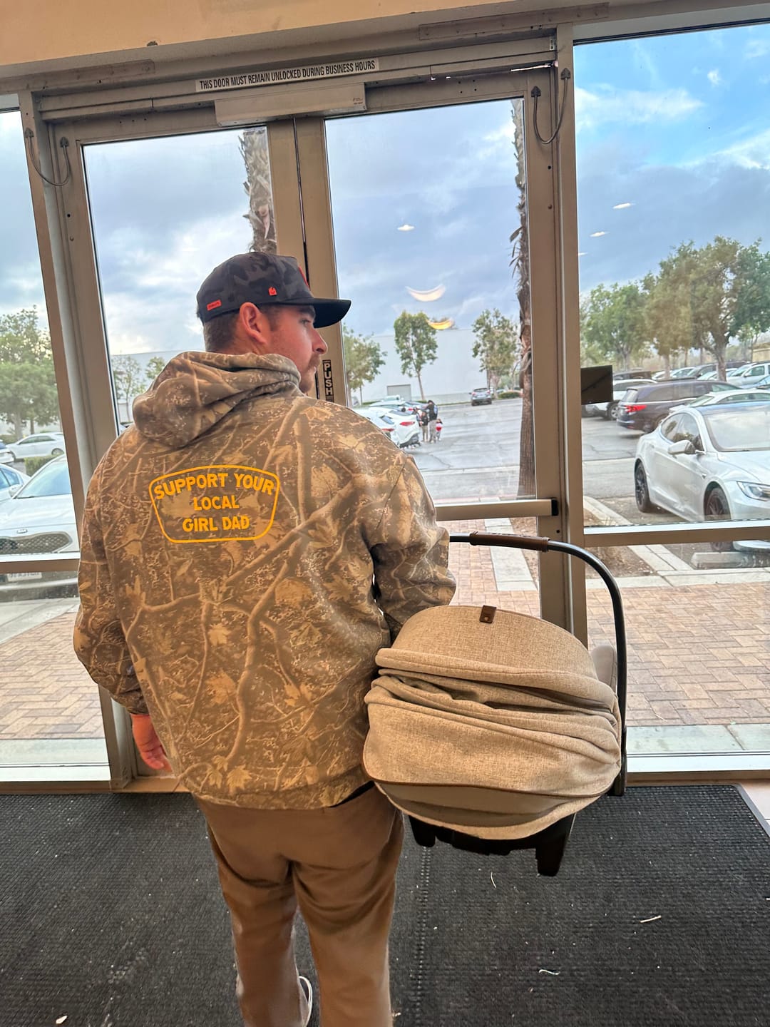 Customer photo review of Support Your Local Girl Dad Hoodie (Tree Camo Edition)