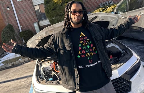 Customer photo review of WARNING TREE CHRISTMAS SWEATER