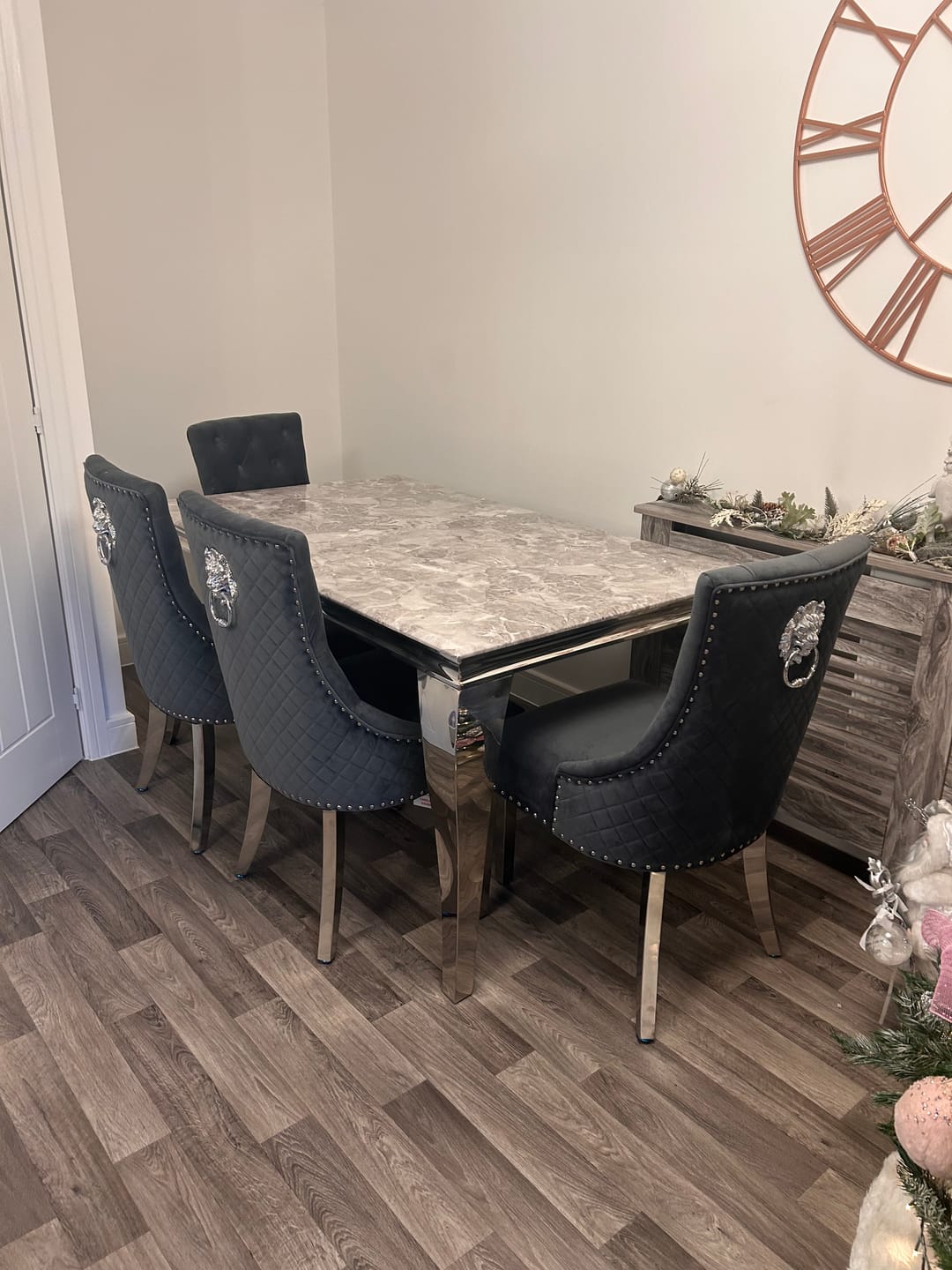 Customer photo review of Vienna Marble Dining Table With Bently Knocker Chairs lion